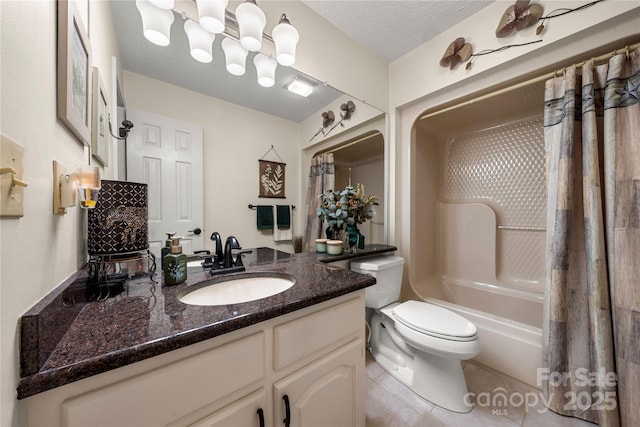 full bathroom featuring tile patterned flooring, vanity, toilet, a textured ceiling, and shower / bath combo with shower curtain