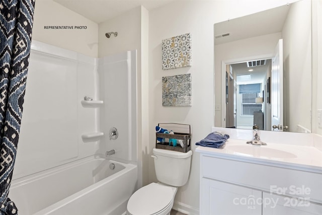 full bathroom with vanity, toilet, and washtub / shower combination