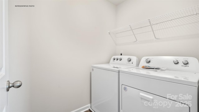 laundry room with separate washer and dryer