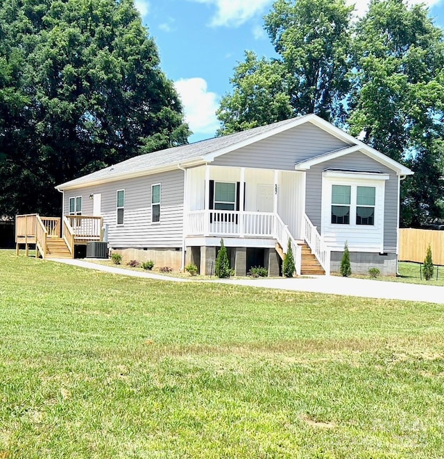507 E Lackey Farm Rd, Stony Point, NC 28678 - manufactured / mobile home with crawl space, covered porch, central AC unit, and stairs