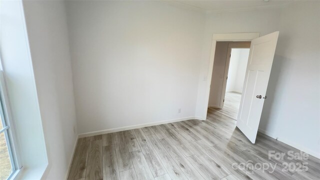 507 E Lackey Farm Rd, Stony Point, NC 28678 - empty room with light wood-style flooring and baseboards
