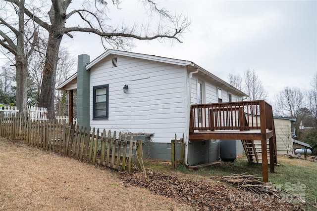 view of home's exterior with a deck