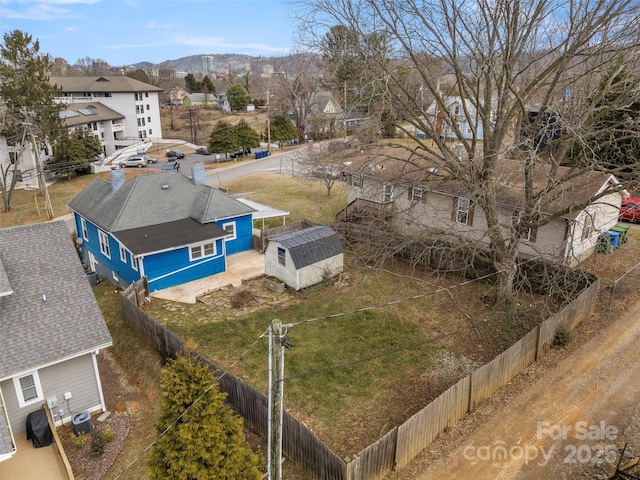 drone / aerial view featuring a mountain view