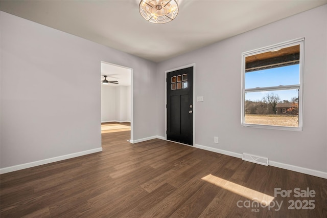 entrance foyer featuring dark hardwood / wood-style floors