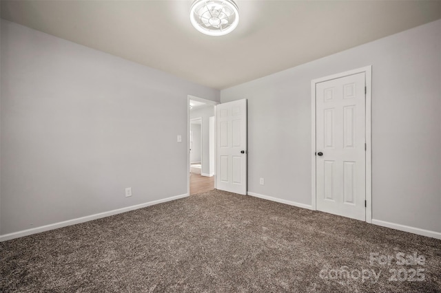 unfurnished bedroom featuring carpet floors