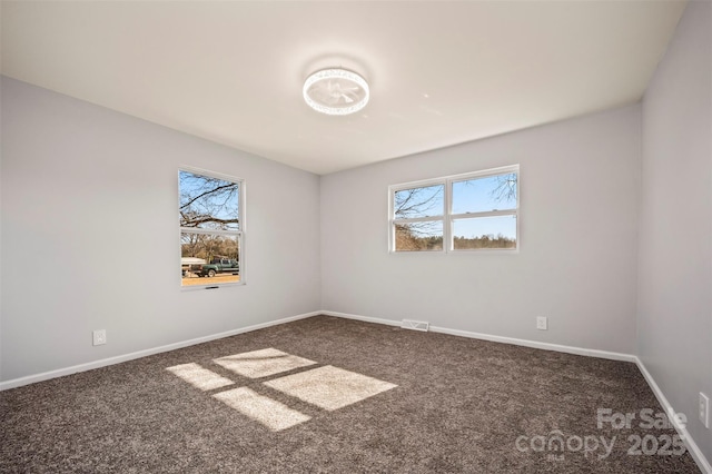 view of carpeted spare room