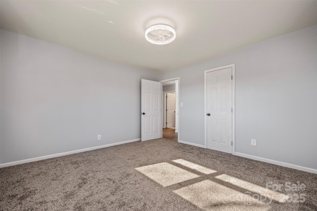 unfurnished bedroom with carpet floors