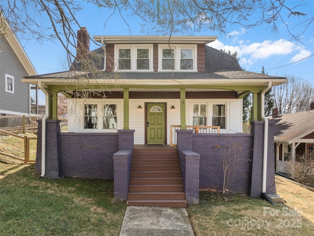 bungalow featuring a porch