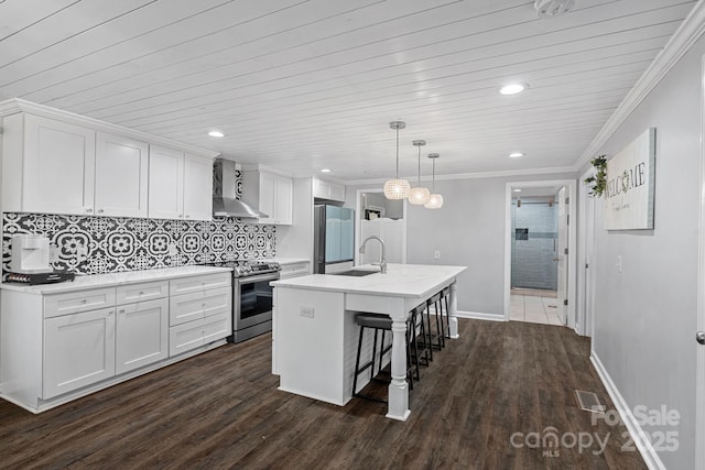 kitchen with stainless steel electric range, sink, white cabinets, a center island with sink, and wall chimney exhaust hood