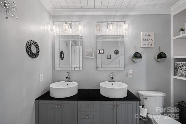 bathroom with vanity, wooden ceiling, crown molding, and toilet