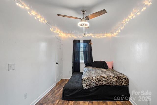 bedroom featuring hardwood / wood-style flooring and ceiling fan