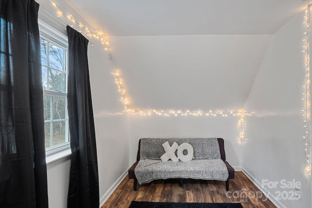 living area with hardwood / wood-style floors