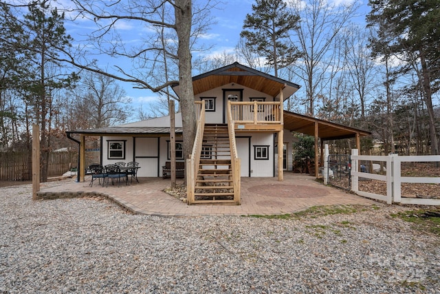 view of front of home with a patio area