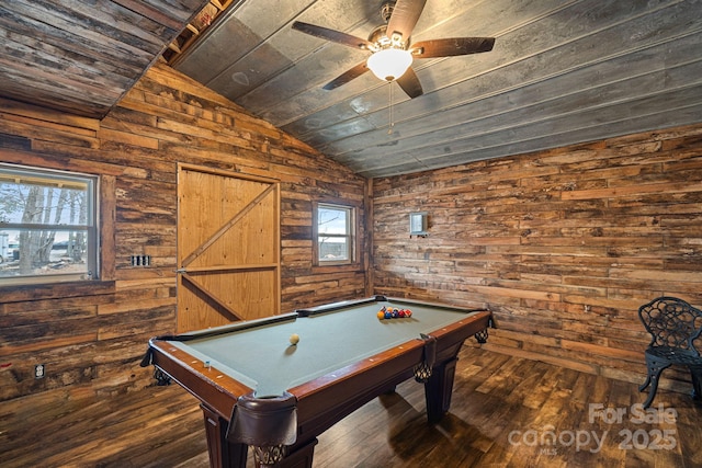 recreation room with plenty of natural light, dark hardwood / wood-style floors, and lofted ceiling