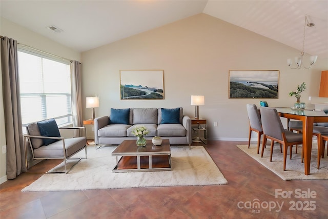 living room with lofted ceiling, plenty of natural light, and a notable chandelier