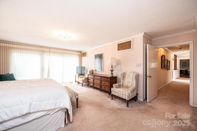 bedroom with ornamental molding and carpet