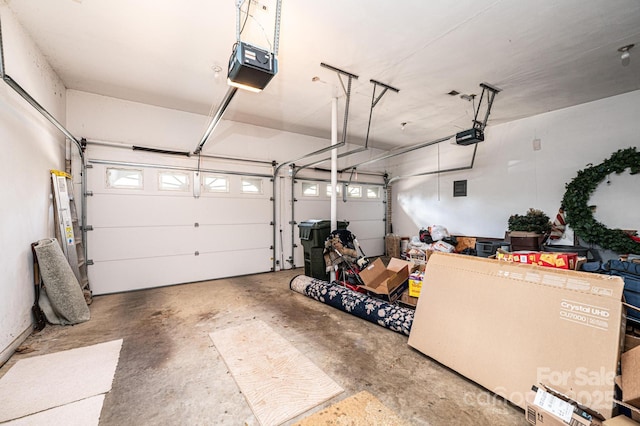 garage featuring a garage door opener