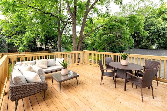 wooden terrace featuring an outdoor hangout area