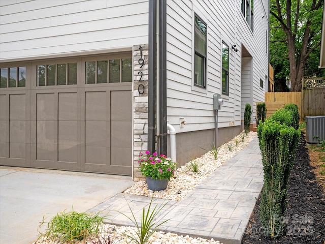 view of property exterior featuring central AC unit