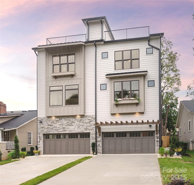 view of front of home with a garage