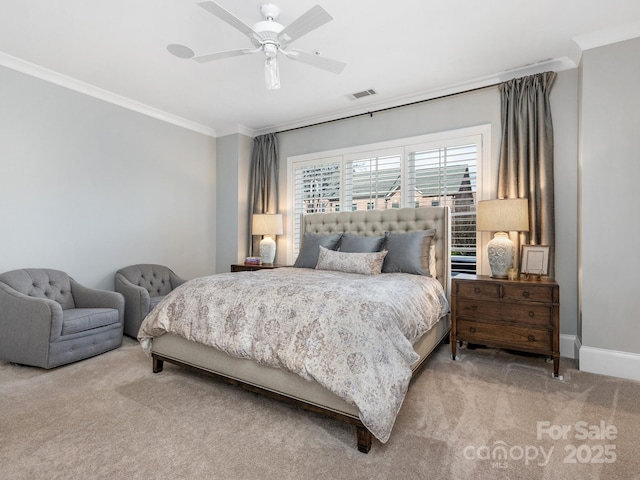 bedroom featuring ornamental molding, carpet flooring, and ceiling fan