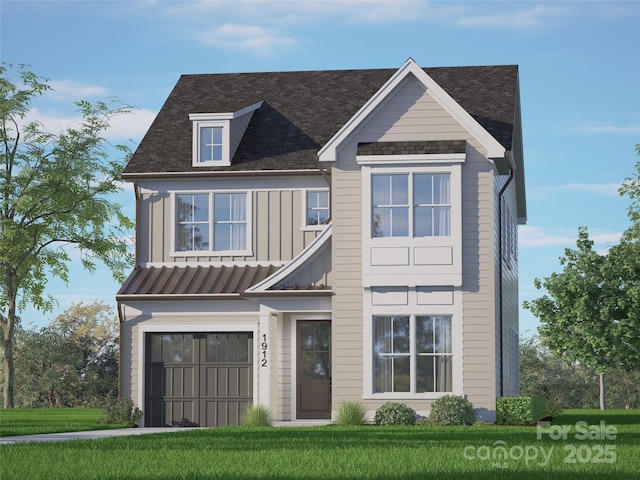 view of front facade with a garage and a front yard