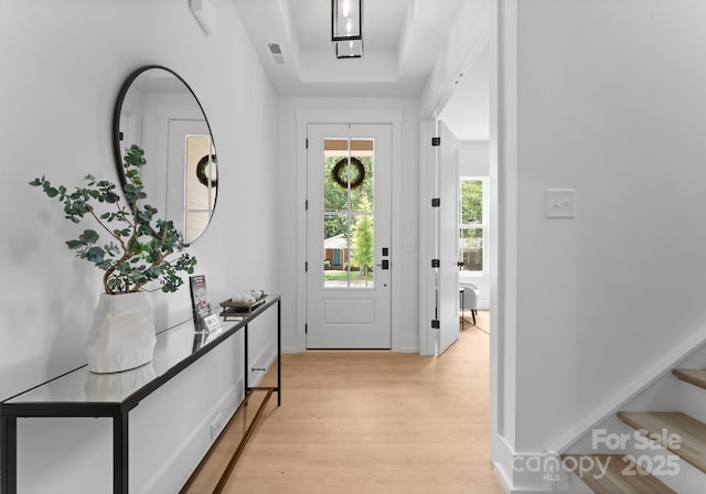1912 St John St, Charlotte, NC 28216 - entrance foyer with a raised ceiling and light wood-style floors