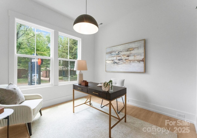 1912 St John St, Charlotte, NC 28216 - office area with wood finished floors and healthy amount of natural light