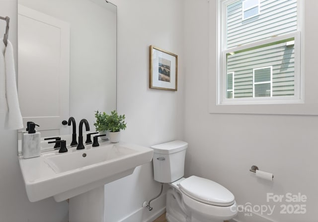 1912 St John St, Charlotte, NC 28216 - bathroom featuring toilet and a sink