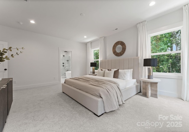 1912 St John St, Charlotte, NC 28216 - bedroom featuring light colored carpet, recessed lighting, and ensuite bathroom
