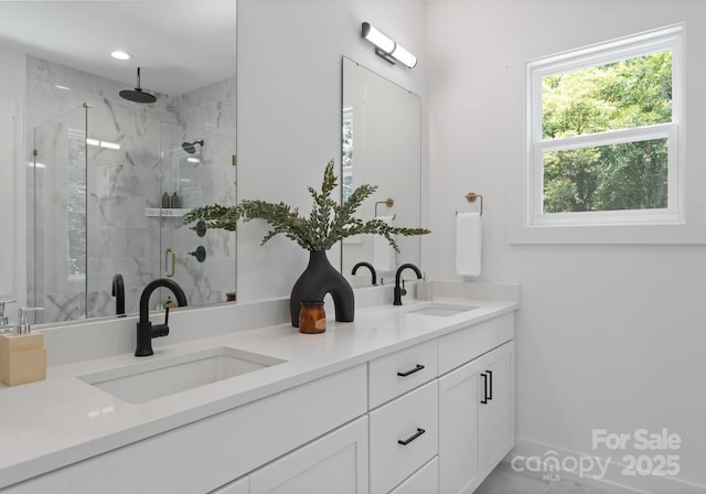 1912 St John St, Charlotte, NC 28216 - bathroom featuring double vanity and a stall shower