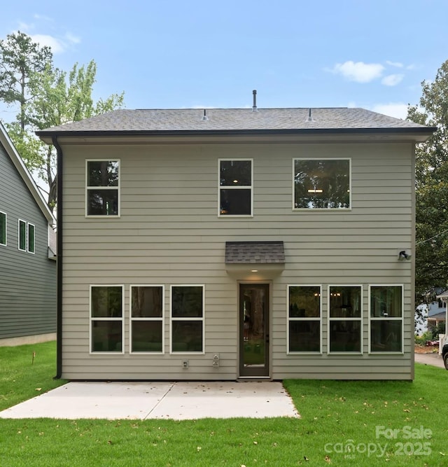 1912 St John St, Charlotte, NC 28216 - rear view of property featuring a patio area and a yard