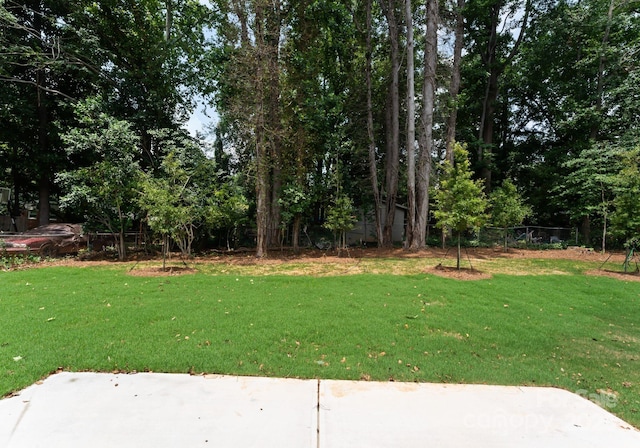 1912 St John St, Charlotte, NC 28216 - view of grassy yard with a patio area