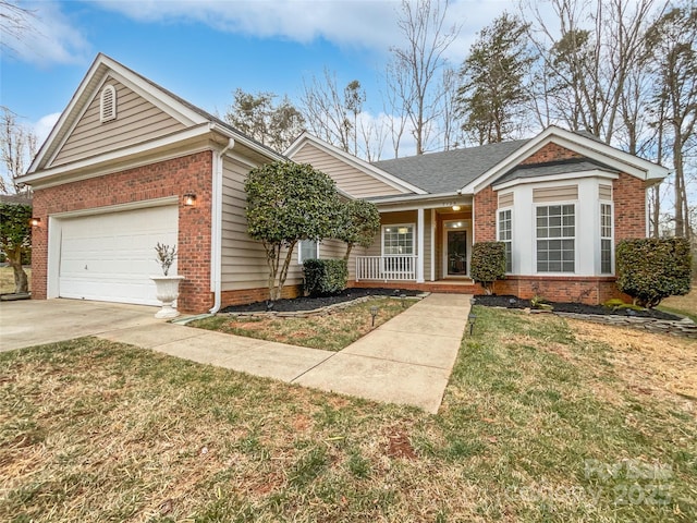 single story home with a garage, a porch, and a front yard