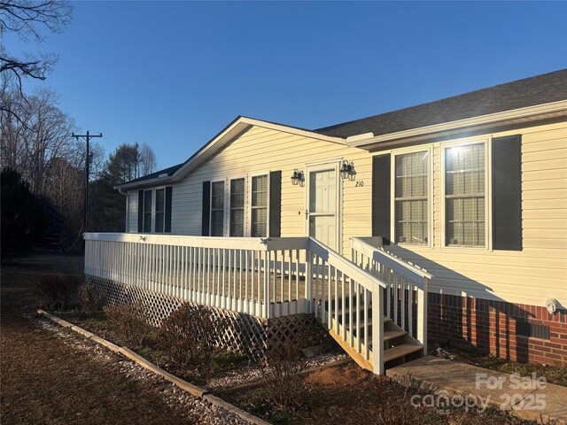 view of front of home with a deck