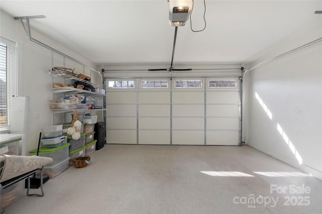 garage featuring a garage door opener