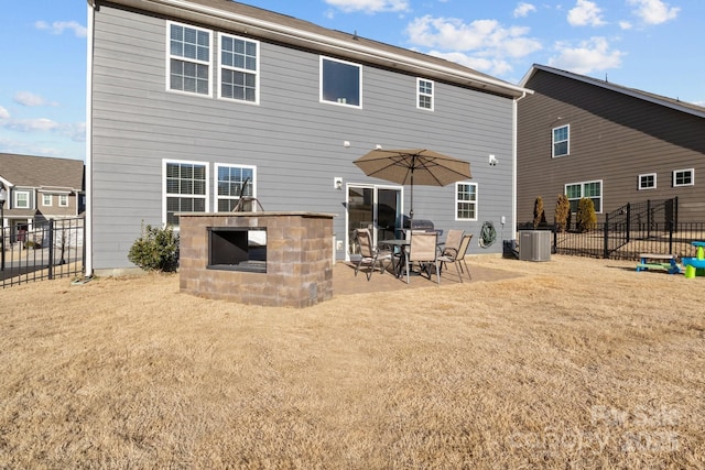 rear view of house with exterior bar, cooling unit, and a patio area