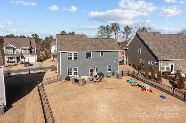 rear view of house with a patio and central air condition unit