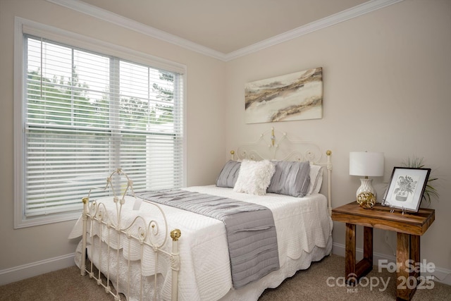 bedroom with ornamental molding and carpet