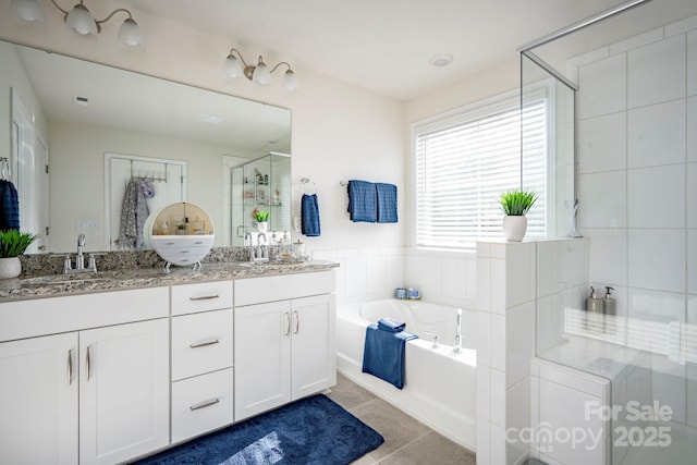 bathroom featuring vanity, separate shower and tub, and tile patterned flooring