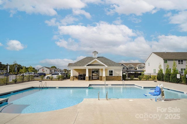 view of swimming pool with a patio