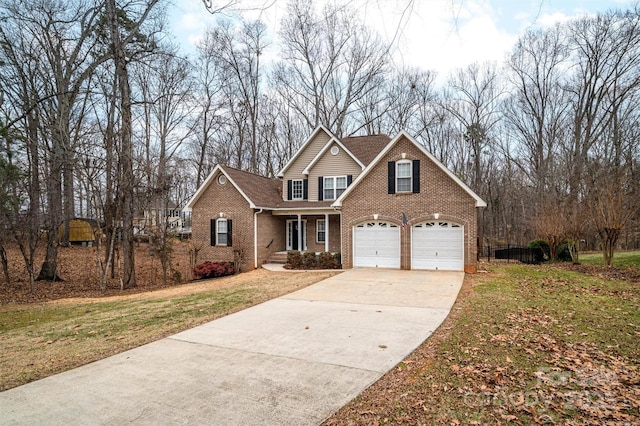 front facade with a garage and a front lawn