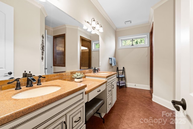 bathroom featuring tile patterned floors, visible vents, crown molding, and a sink