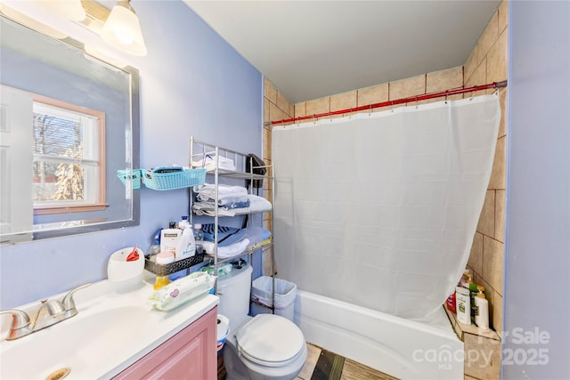 full bathroom featuring shower / bathtub combination with curtain, vanity, and toilet