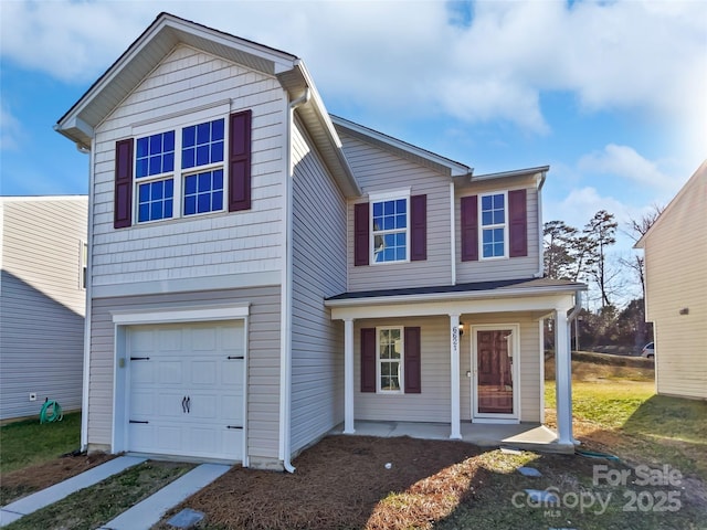 front of property with a garage and a porch