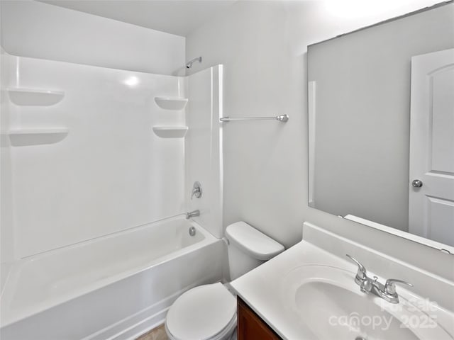 full bathroom featuring shower / washtub combination, vanity, and toilet