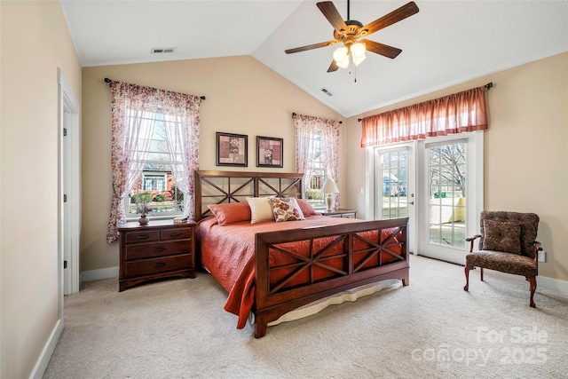 carpeted bedroom featuring access to exterior, vaulted ceiling, and ceiling fan