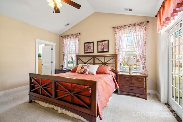 bedroom featuring lofted ceiling, light colored carpet, and ceiling fan