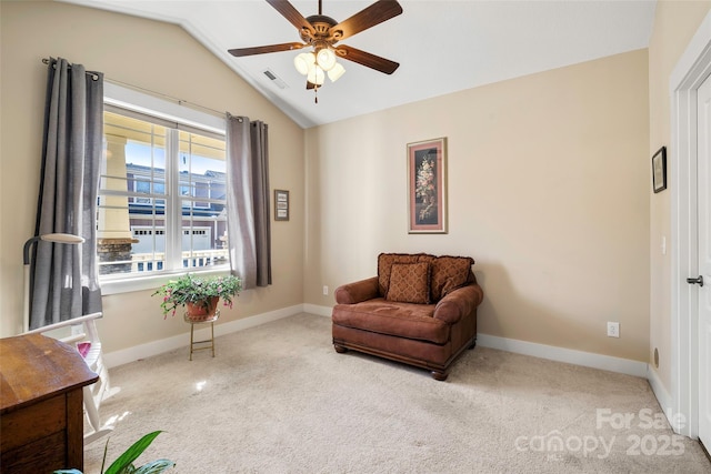 sitting room featuring lofted ceiling, light carpet, and ceiling fan