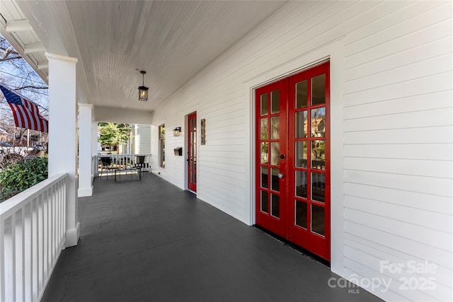 view of patio featuring french doors and covered porch